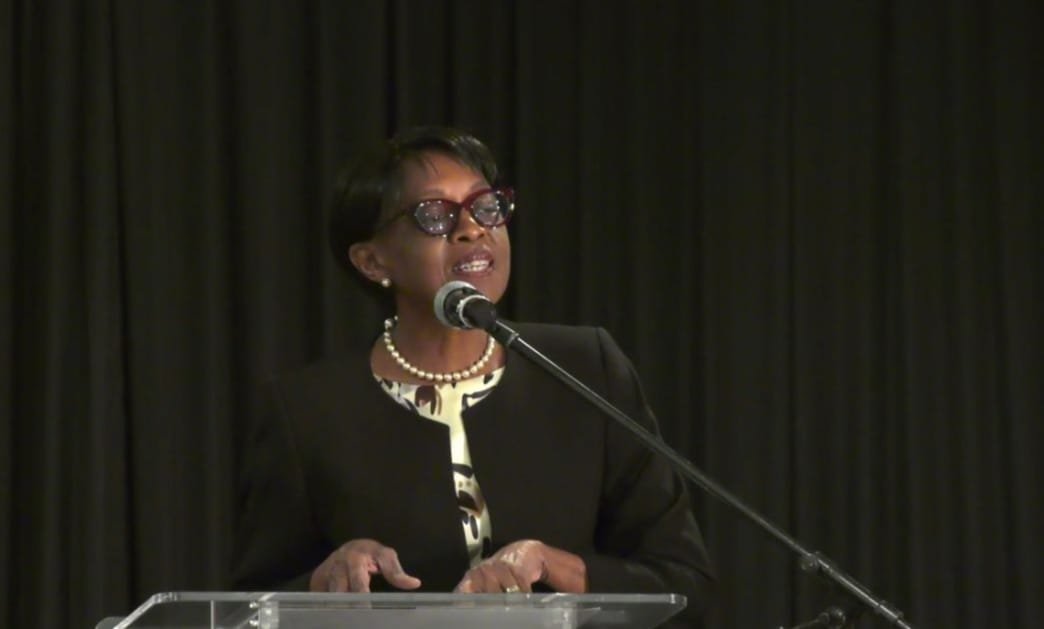 Dr Matshidiso Moeti speaks at a lectern