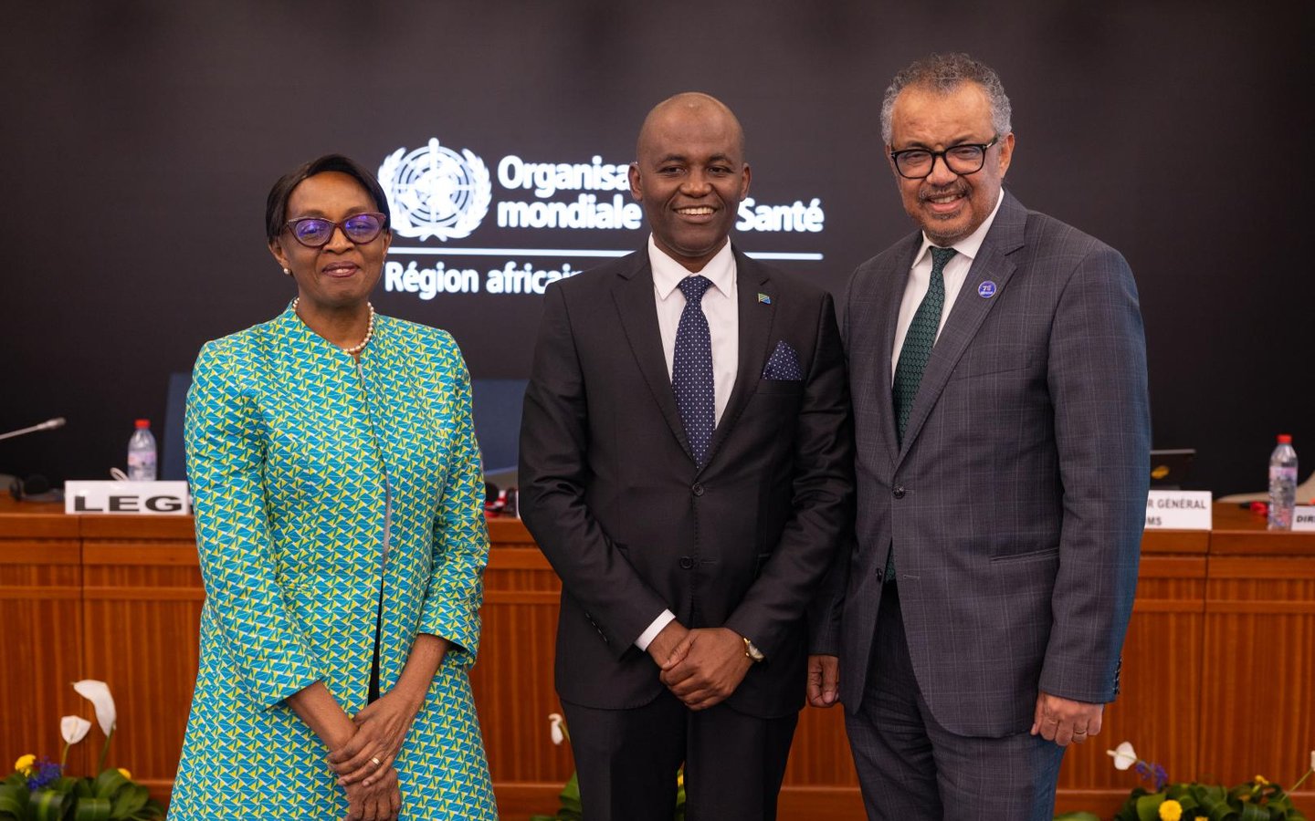 Dr. Faustine Engelbert Ndugulile stands with Dr Moeti, present Regional Director of WHO AFRO and Dr Tedros Adhanom Ghebreyesus, WHO Director-General