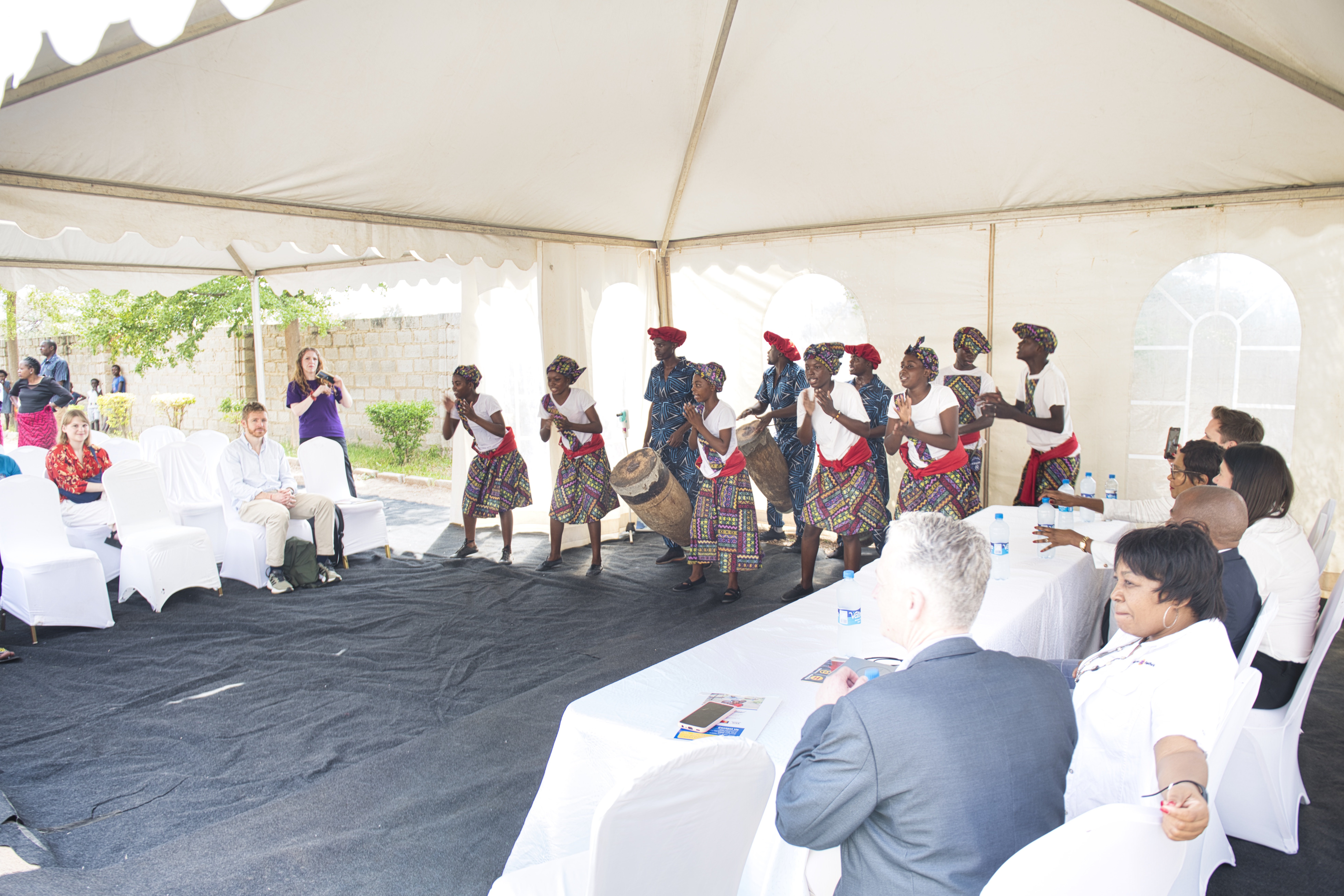 Lisa Nandy MP and her team being entertained by traditional dancers