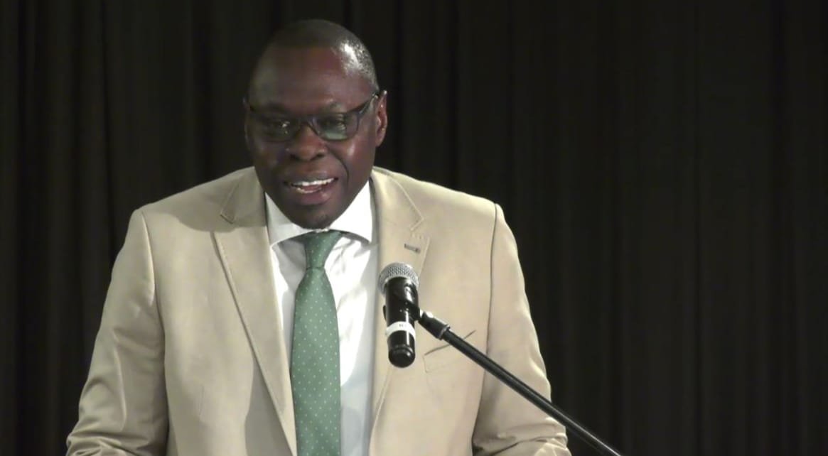 Dr Soce Fall speaks at a lectern